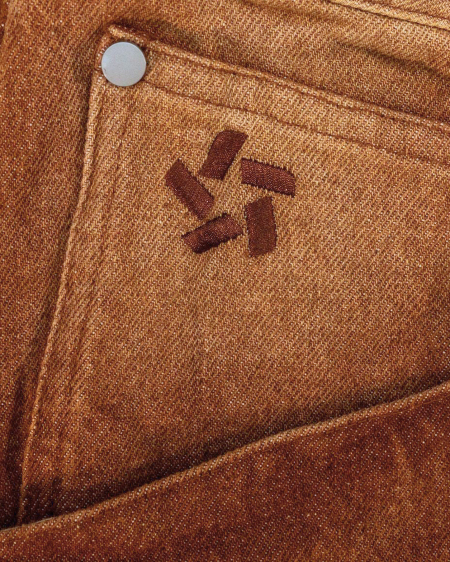 BROWN WASHED DENIM.